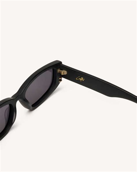 dezi sunglasses cuffed.